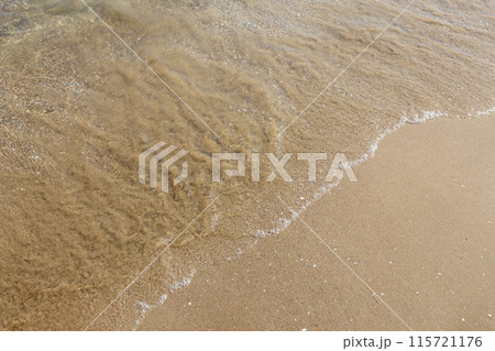 Blue ocean wave on sandy beach. Nature Background, summer time Blue ocean wave on sandy beach. Nature Background, summer time 115721176