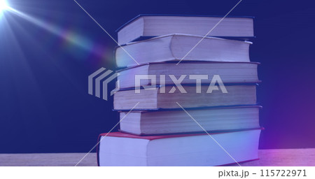 Image of glowing light over stack of books on...のイラスト素材 [115722971] - PIXTA