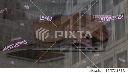 Image of numbers processing over modern office building and caucasian man using laptop 115723218