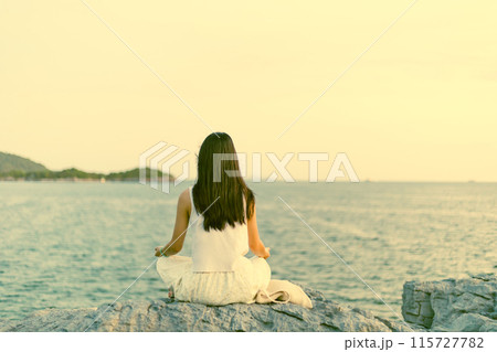 Woman Looking at the Sunset 115727782