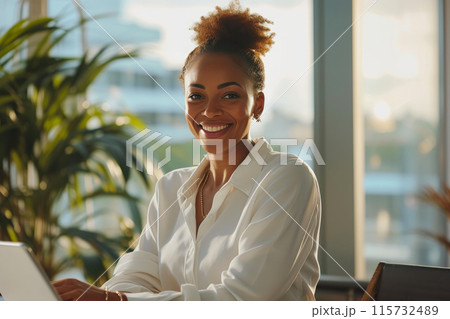 Confident Insurance Agent Embraces Success in Sunlit Office 115732489