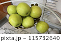 Fruit plate on glass table, bowl with green and ripe apples, natural products 115732640