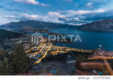 Beautiful sunset sky over illuminated Queenstown with Lake Wakatipu at New Zealand 115733302