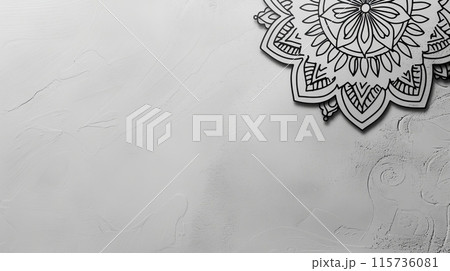 A sleek, light grey background with a simple, yet sophisticated, black mandala A sleek, light grey background with a simple, yet sophisticated, black mandala 115736081