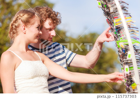 young couple buying new sunglasses outdoor young couple buying new sunglasses outdoor 115737303