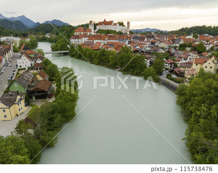 Fussen, Bavaria, Germany. Aerial view over the medieval town at sunset time. Historical Palace, Hohes Schloss. 115738476