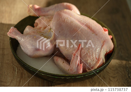 Chicken baked on salt. Selective focus, close-up.2 115738737