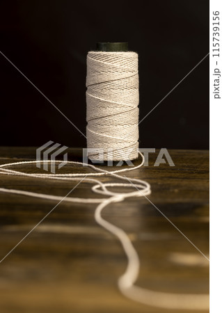 thin cotton thread for use in cooking 115739156