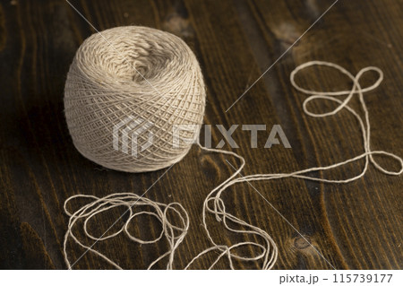 a spool of light thread for sewing a spool of light thread for sewing 115739177