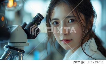 Female Asian Scientist Using Microscope In Research Lab Female Asian Scientist Using Microscope In Research Lab 115739733