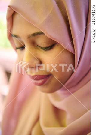 Close up Portrait of a Joyful Middle Eastern Hijabi Close up Portrait of a Joyful Middle Eastern Hijabi 115741575