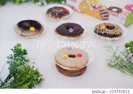 donuts with delicious topping as a background donuts with delicious topping as a background 115741611
