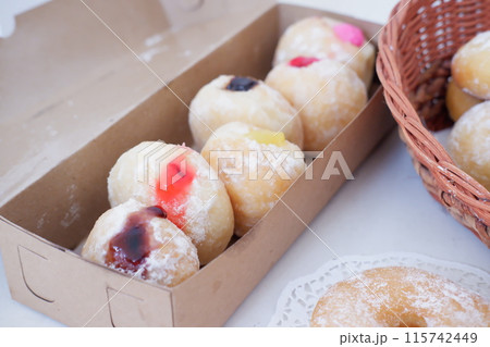 flavored ball donuts as a background flavored ball donuts as a background 115742449