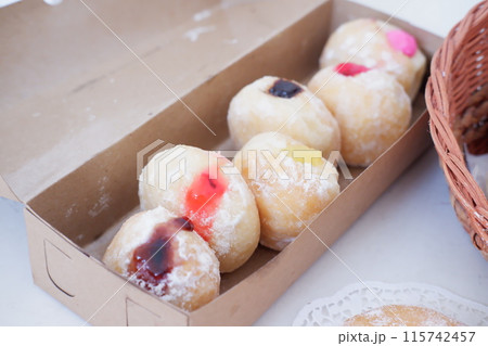 flavored ball donuts as a background flavored ball donuts as a background 115742457