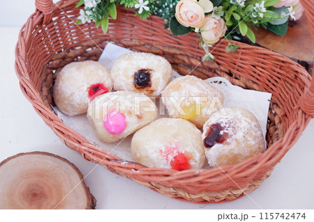 flavored ball donuts as a background flavored ball donuts as a background 115742474