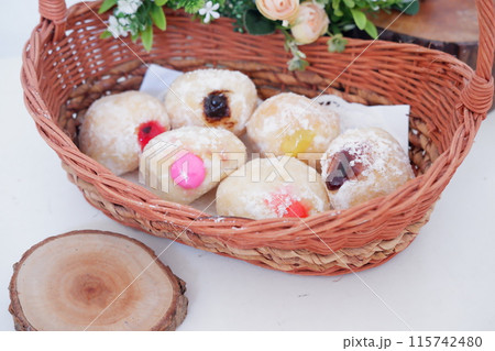 flavored ball donuts as a background flavored ball donuts as a background 115742480