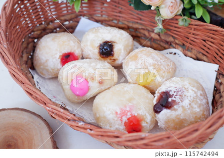 flavored ball donuts as a background flavored ball donuts as a background 115742494