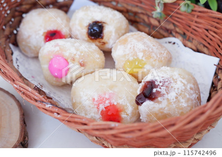 flavored ball donuts as a background flavored ball donuts as a background 115742496