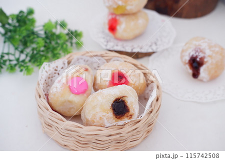 flavored ball donuts as a background flavored ball donuts as a background 115742508