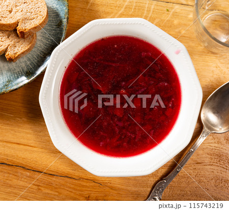 Borscht soup with beets served in bowl Borscht soup with beets served in bowl 115743219