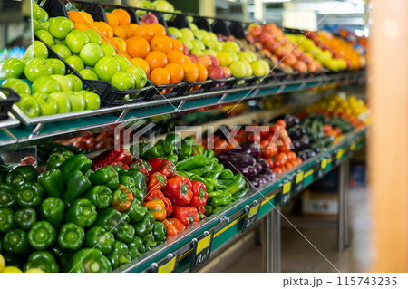 vegetables and fruits lie on the supermarket shelves 115743235