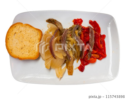 Festive and everyday vegetable dish of Catalan cuisine is escalibada with salted anchovies Festive and everyday vegetable dish of Catalan cuisine is escalibada with salted anchovies 115743898