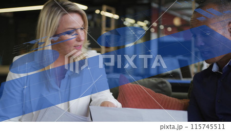 Image of infographic interface and diverse colleagues discussing over laptop in office 115745511