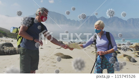 Image of covid 19 cells floating over senior couple wearing face masks with backpacks on beach Image of covid 19 cells floating over senior couple wearing face masks with backpacks on beach 115745526