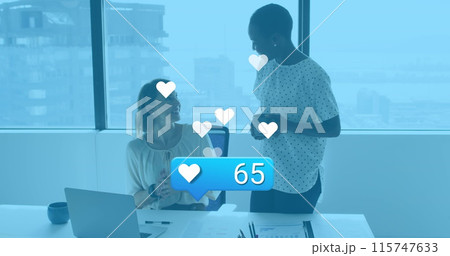 Image of social media reactions over diverse female coworkers in office Image of social media reactions over diverse female coworkers in office 115747633