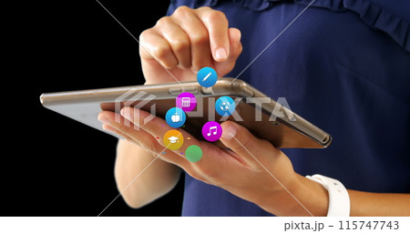 Image of colorful icons over biracial woman using tablet 115747743