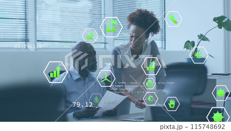 Image of icons and computer language over diverse coworkers discussing reports 115748692