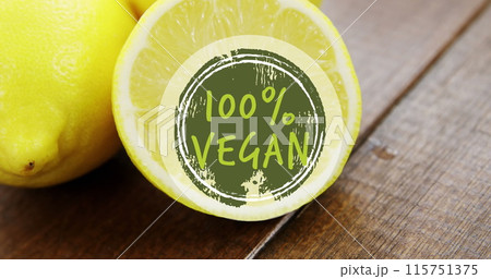 Image of 100 percent vegan text over fresh lemons Image of 100 percent vegan text over fresh lemons 115751375