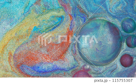Top view of macro abstract photography of the oil droplet on rainbow metallic acrylic background Top view of macro abstract photography of the oil droplet on rainbow metallic acrylic background 115755307