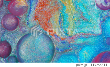 Top view of macro abstract photography of the oil droplet on rainbow metallic acrylic background 115755311