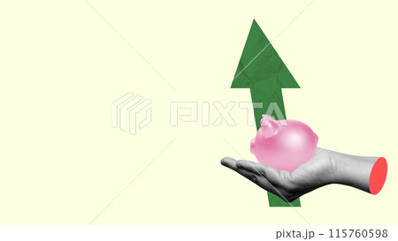 A human hand holding a piggy bank with an increased graph arrow 115760598
