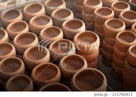 Set of arranged pots made of clay Set of arranged pots made of clay 115760913