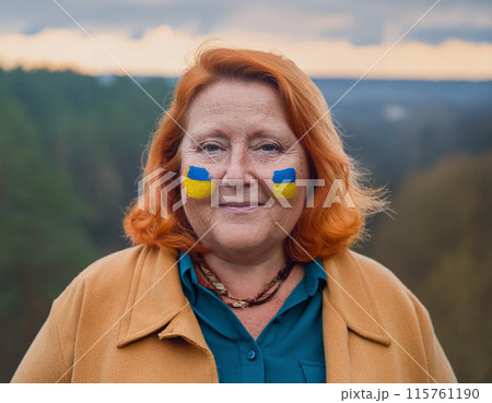 Patriotic Portrait with Ukrainian Flag Face Paint Patriotic Portrait with Ukrainian Flag Face Paint 115761190