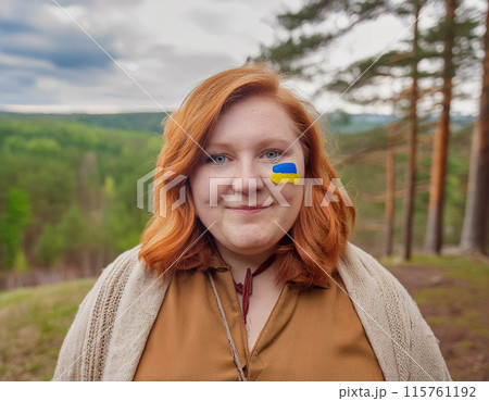 Patriotic Portrait with Ukrainian Flag Face Paint Patriotic Portrait with Ukrainian Flag Face Paint 115761192