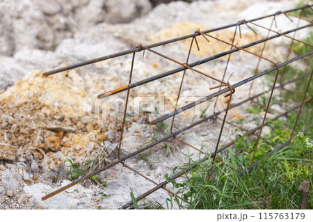 Reinforcement cage for concrete basement lays on the ground Reinforcement cage for concrete basement lays on the ground 115763179