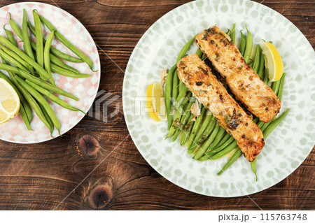 Baked salmon with green fresh vegetable. 115763748