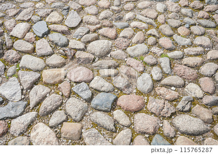 Old stone pavement texture. Abstract background of cobblestone pavement. Seamless texture. Tileable Texture. High quality photo Old stone pavement texture. Abstract background of cobblestone pavement. Seamless texture. Tileable Texture. High quality photo 115765287