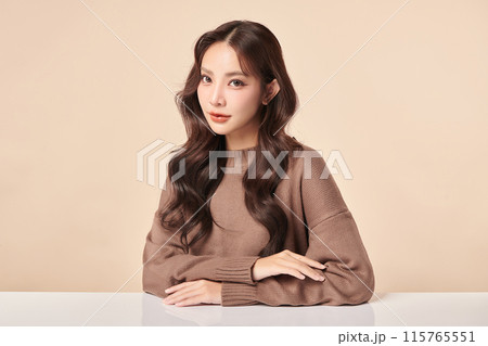 Beautiful young asian woman with clean fresh skin on beige background, Face care, Facial treatment, Cosmetology, beauty and spa, Asian women portrait. Beautiful young asian woman with clean fresh skin on beige background, Face care, Facial treatment, Cosmetology, beauty and spa, Asian women portrait. 115765551