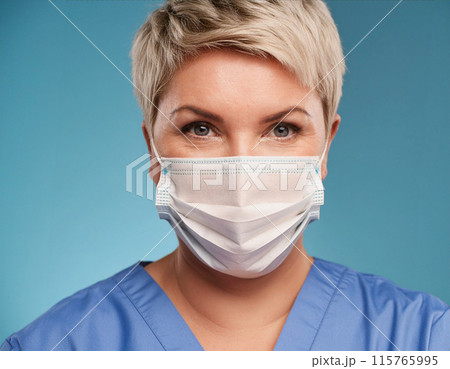 Female Healthcare Professional in Uniform Wearing Face Mask Female Healthcare Professional in Uniform Wearing Face Mask 115765995
