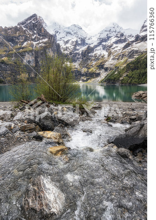 Oeschinensee Lake and nearby stream Oeschinensee Lake and nearby stream 115766360