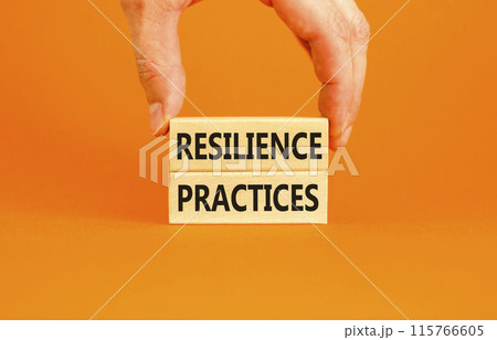 Resilience practices symbol. Concept word Resilience practices typed wooden blocks. Beautiful orange table orange background. Businessman hand. Business and resilience practices concept. Copy space. Resilience practices symbol. Concept word Resilience practices typed wooden blocks. Beautiful orange table orange background. Businessman hand. Business and resilience practices concept. Copy space. 115766605