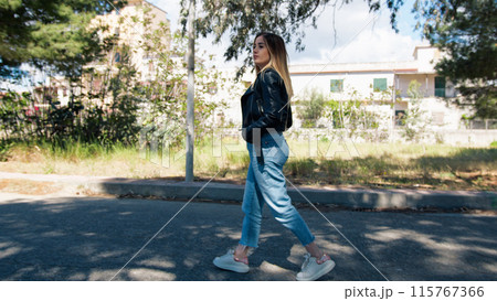 Woman Walking At The Park In The Morning  115767366