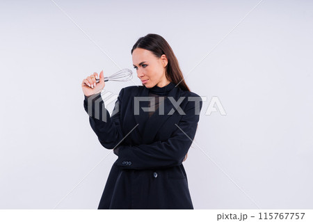 Young thoughtful pensive wistful fun housewife. Cooking food process concept. 115767757