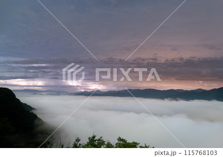 On a summer night, the sea of clouds surges and lightning flashes. On a summer night, the sea of clouds surges and lightning flashes. 115768103