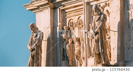 Rome, Italy. Details Of Arch Of Constantine. Statue And Bas-relief On Facade Of Triumphal Arch Rome, Italy. Details Of Arch Of Constantine. Statue And Bas-relief On Facade Of Triumphal Arch 115768430