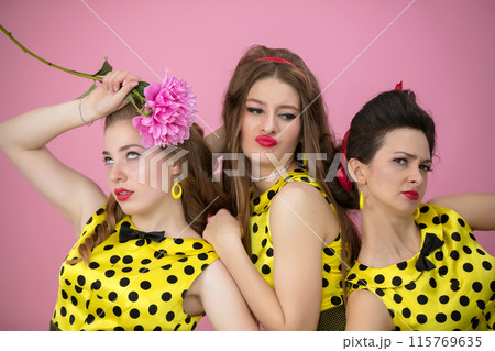 Funny retro girls. A group of women grimaces. Funny retro girls. A group of women grimaces. 115769635